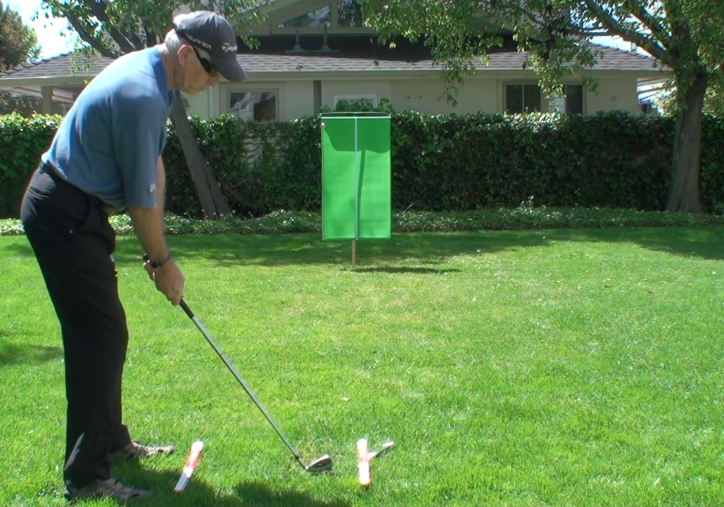 OUTDOOR SWING PLANE AND CLUB HEAD RELEASE TRAINING WITH VELCRO TRAINING TARGET
